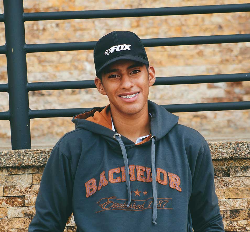 Teenage boy wearing metal braces